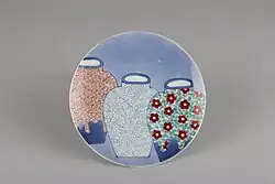 Plate with three jars