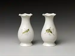 Ware painted with colored enamels over a transparent glaze, Qing dynasty. Metropolitan Museum of Art.