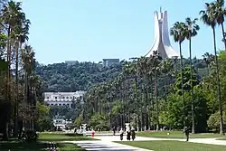 A panoramic view of Maqam Echahid (Martyrs' Memorial) as seen from the Botanical Garden Hamma (Jardin d'Essai du Hamma) in Algiers, Algeria.