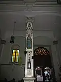A sculpture of St. Elizabeth of Hungary, one of the sixteen female saints inside the church