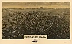 A meticulously rendered drawing of a small town split in half by railroad tracks, with a domed courthouse anchoring the north side.