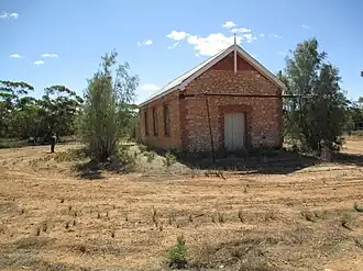 Maggea hall building showing 1919 date of first use