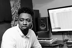Record producer Magnom in his studio working.