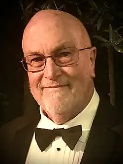 Snead in black tuxedo