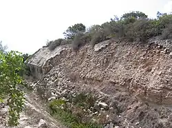 Scarp collapse