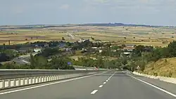 The village of Maltepe, seen in the distance. Photo taken in 2023.