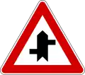 Offset side roads with priority, first to the left (also uses )
