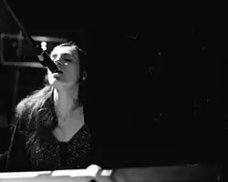Faith Coloccia performing in 2015