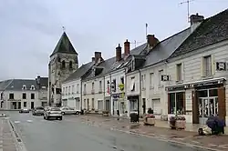 The shops and church in the centre of Manthelan