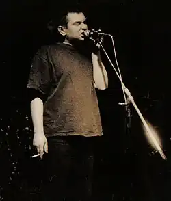 Świetlicki performing at a concert in Nowa Sól, 1997
