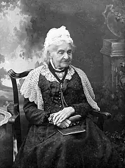 Margaret sitting on a chair aged 110 in 1902
