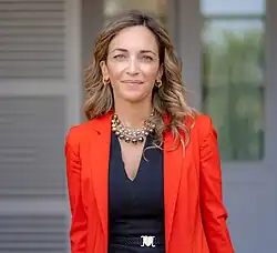A woman wearing a suit
