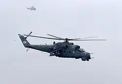 Baltic Fleet Naval Aviation Mil Mi-24VP and Kamov Ka-27PS (background) helicopters during a military exercise of the 336th Separate Guards Naval Infantry Brigade, 2017