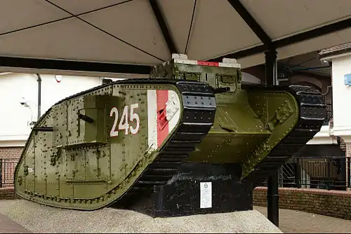 Image 19 Mark IV tank Photograph: Peter Trimming The Mark IV tank was introduced by the British in May 1917 to fight in World War I. The "female" version, as pictured here, was armed with five machine guns. Production of the Mark IV ceased at the end of the War in 1918. A small number served briefly with other combatants afterwards. This Mark IV tank, on display in Ashford, Kent, was presented to the town after the end of World War I. The engine was removed to install an electricity substation inside it, though this substation was subsequently removed; the tank's interior is now empty. More selected pictures