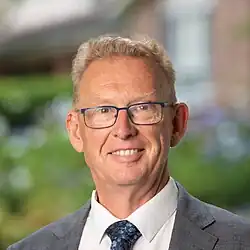 Portrait of Mark Parton MLA, Member for Brindabella, outside, in daylight.