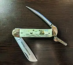 Slip joint knife with marlinspike