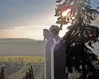 Memorial with portraits at the tomb of Max Klinger and Gertrud Klinger by Johannes Hartmann, Großjena, Germany