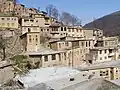 The yard of the above building is the roof of the below building