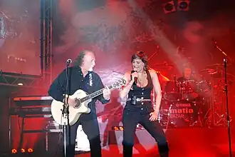 Matia Bazar performing in June 2007. From left to right: Piero Cassano, Roberta Faccani, and Giancarlo Golzi