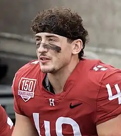 Matthew Hudson playing football for Harvard in 2023