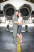 Lohmeier and his wife behind an F-15C