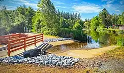 A view of the walking trail and pond in Meadow Vista