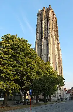 An ornate stone brick bell tower