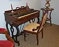 Portable melodeon[46] or lyre-leg melodeon[45]