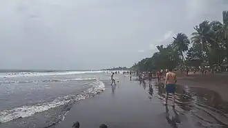Image 26Limbe Beach with people engaging in various activities (from Tourism in Cameroon)