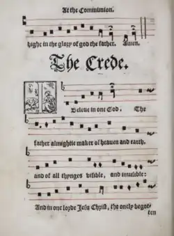 Paper with plainchant written onto it with printed letters.