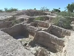 A large plaza in front of the Mesa Grande Temple Mound which was enclosed by a large adobe wall.