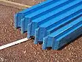 Roll-formed metal roof purlins, also called roof battens. They are cropped to the angle of the purlin top cuts and can be lapped for joining.