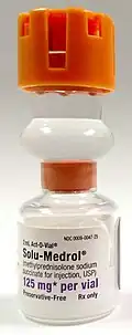 orange capped glass vial of Solu-Medrol 125 mg
