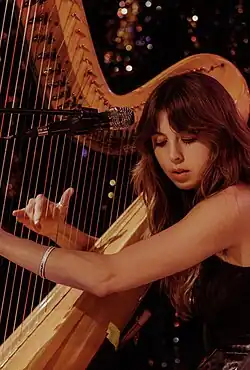 Davis performing in 2023