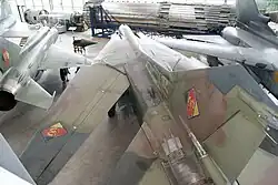 Mikoyan-Gurevich_MiG-23BN_Flogger-H_Red_701_Luftstreitkräfte_der_NVA_JBG-37_AboveLRear_DMFO_10June2013_(14400263809)