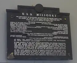 Plaque over the door to the Captain's Cabin on board the Missouri marking the signing.