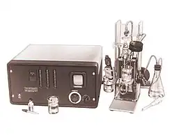 A complex tube and flask apparatus attached to a measurement station