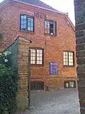 Brick building of the left wing