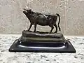 Miniature cabinet bronze of a dairy cow on a slate plinth