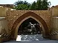 The ancient archaeological gate leading to the three monastery churches (without the fortress).