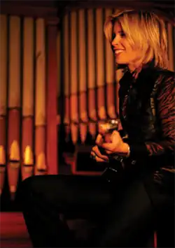 Monique Rhodes performing at a studio.
