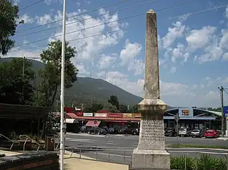 War memorial in the centre of Montrose, with the Dandenong Ranges in the background