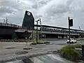 The view of the clock tower feature and train at platform from the southern entrance, October 2024