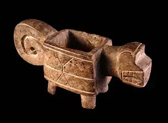 Ceremonial andesite mortar in the form of a jaguar of the Valdivia culture.