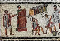 Image 17Musicians playing a Roman tuba, a water organ (hydraulis), and a pair of cornua, detail from the Zliten mosaic, 2nd century AD (from Culture of ancient Rome)