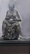 The statue of a mother breast-feeding a child