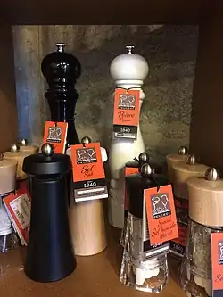 Modern Peugeot pepper or salt grinders.