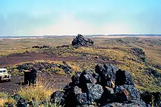 1964 photograph showing iron ore outcrops on the top of Mount Goldsworthy before mining commenced