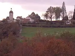 Mourjou seen from Jalenques, during an autumn evening