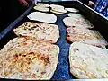 Msemmen, usually served with honey, mint tea or coffee, can also be stuffed with meat